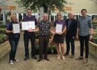 Fairways Garden Centre, Ashbourne with their awards & (centre) Michael Cole, (2nd right) Mike Lind &